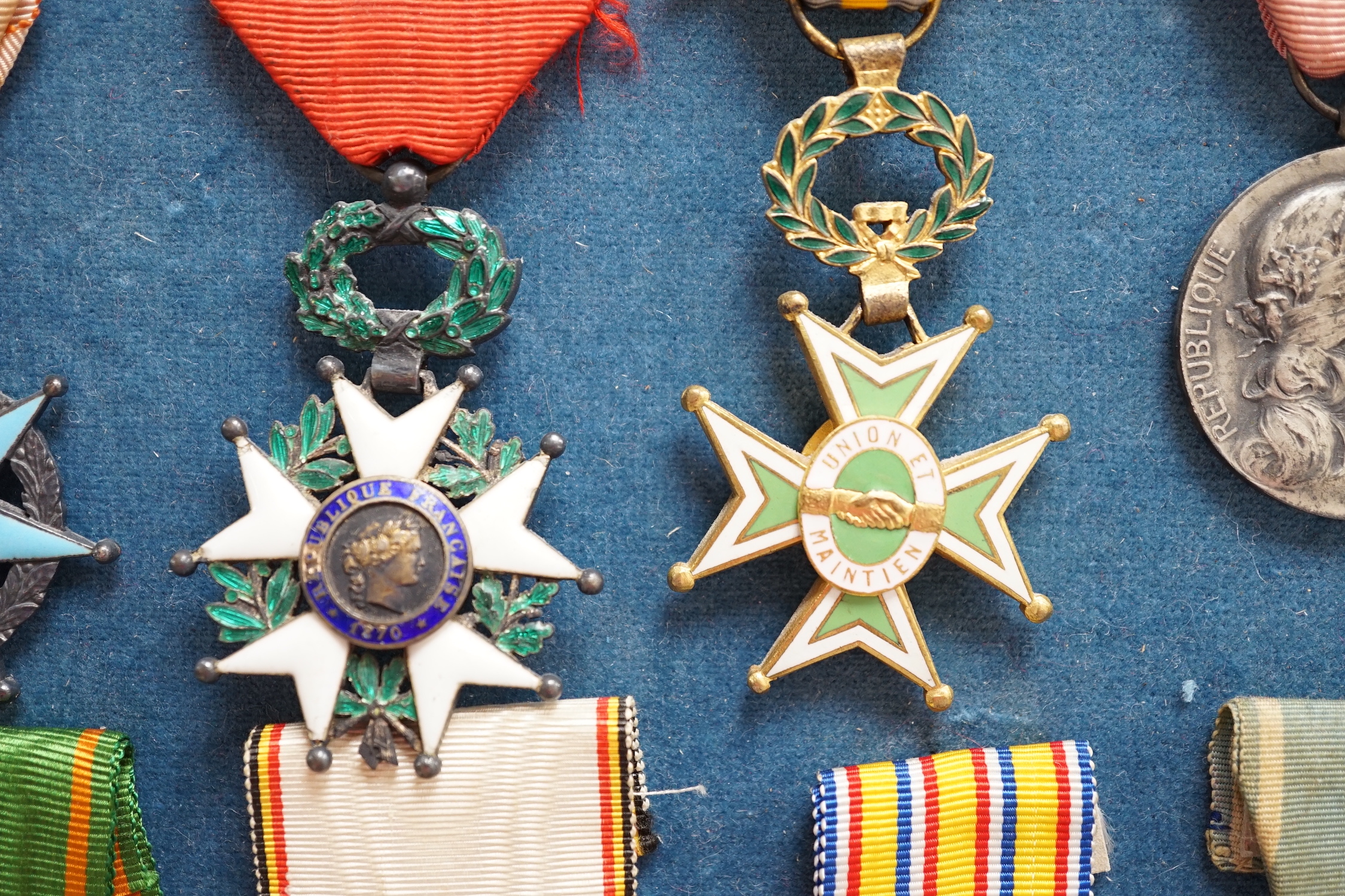 Eighteen French medals, including The War Cross, TOE French Legion Cross, Medal of Honour, Croix du Combatant Medal, WWI Commemorative Medal, 1870 Military Medal, 1914-18 Victory Medal, etc.